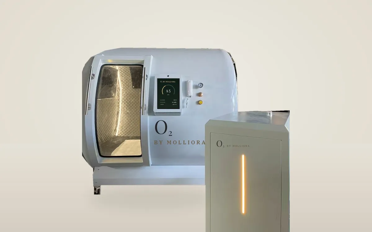 O₂ Duo seated hyperbaric chamber, ivory finish, with its host unit